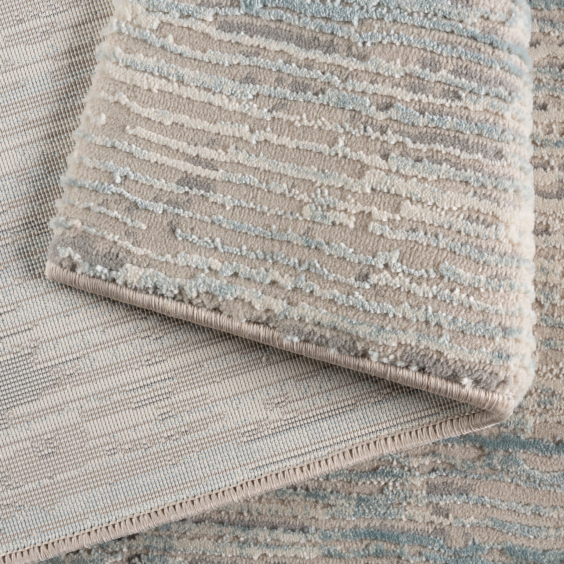 moderner-teppich-arya-6610-blau-detail