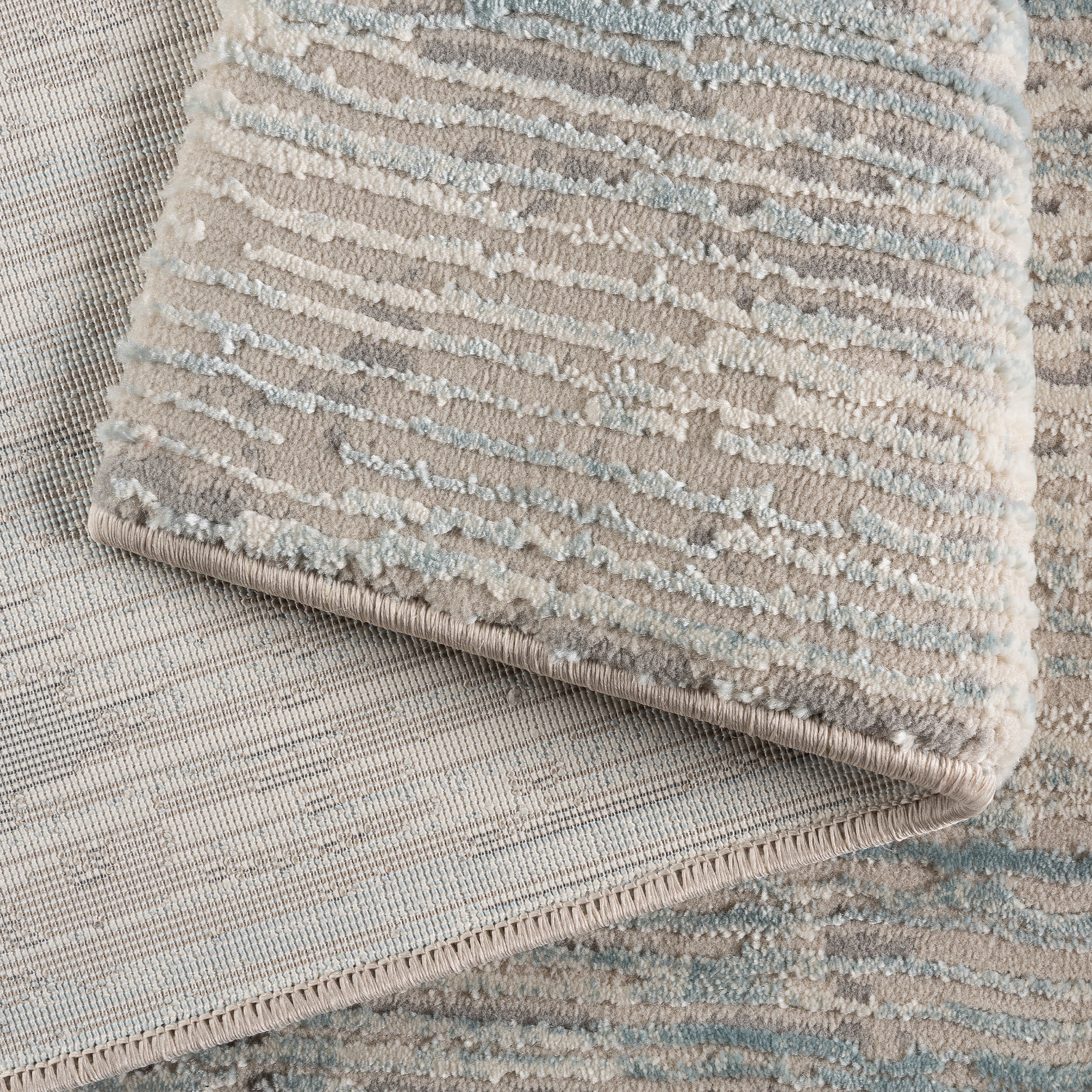moderner-teppich-arya-6610-blau-detail