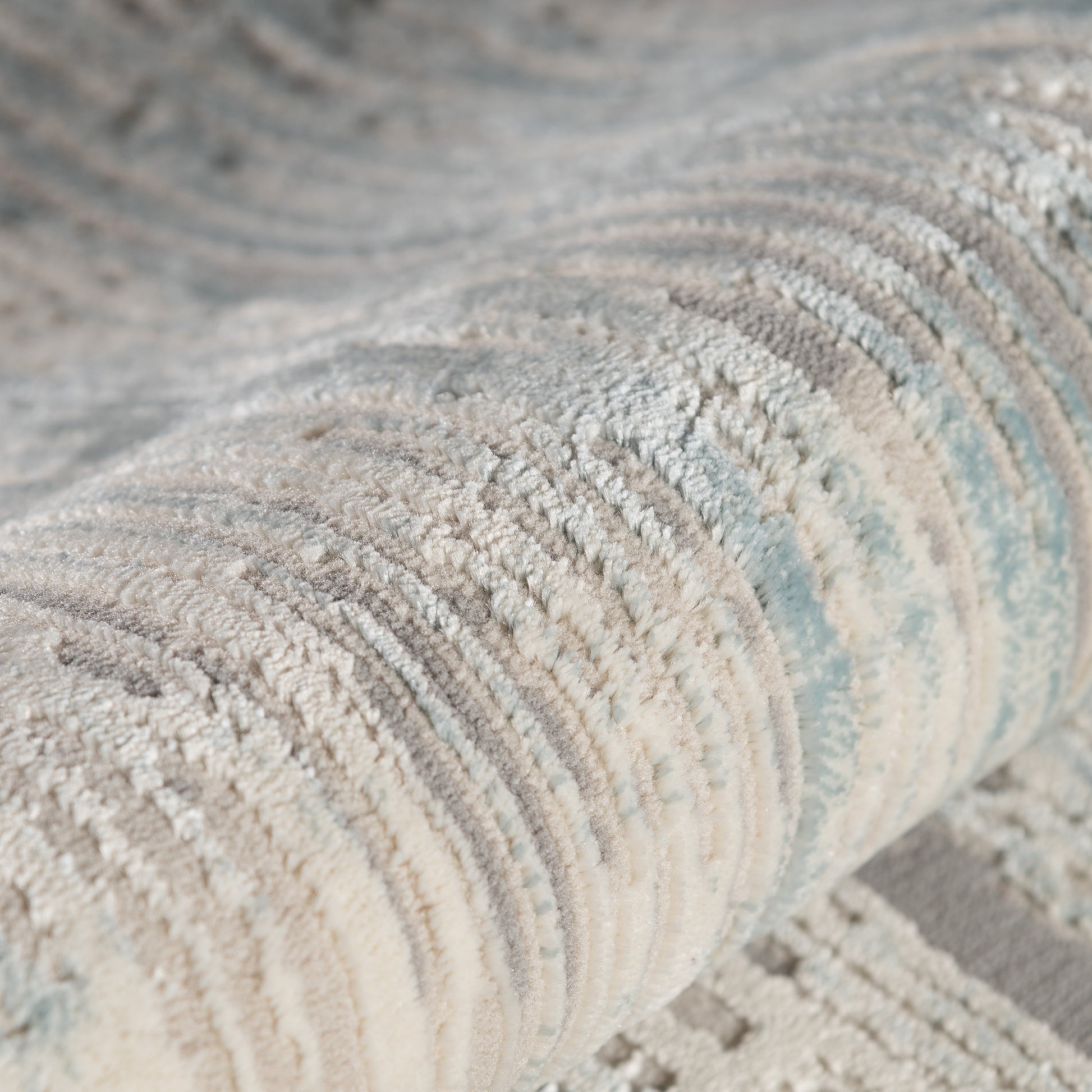 moderner-teppich-arya-6610-blau-wave